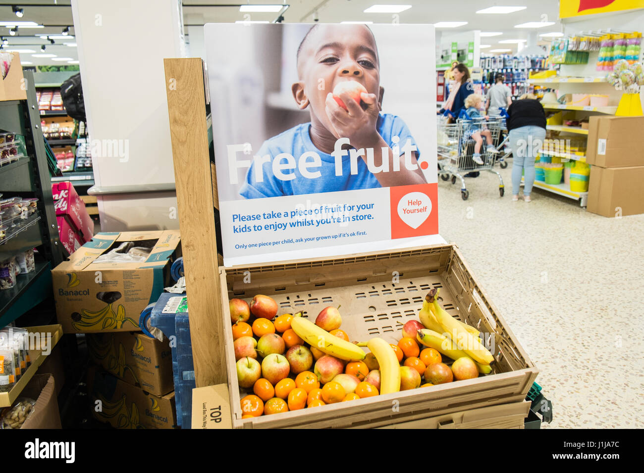 Free,fruit,for,children,healthy,health,option,Tesco,superstore,supermarket,Liverpool,Merseyside,England,City,City,Northern,North,England,English,UK. Stock Photo