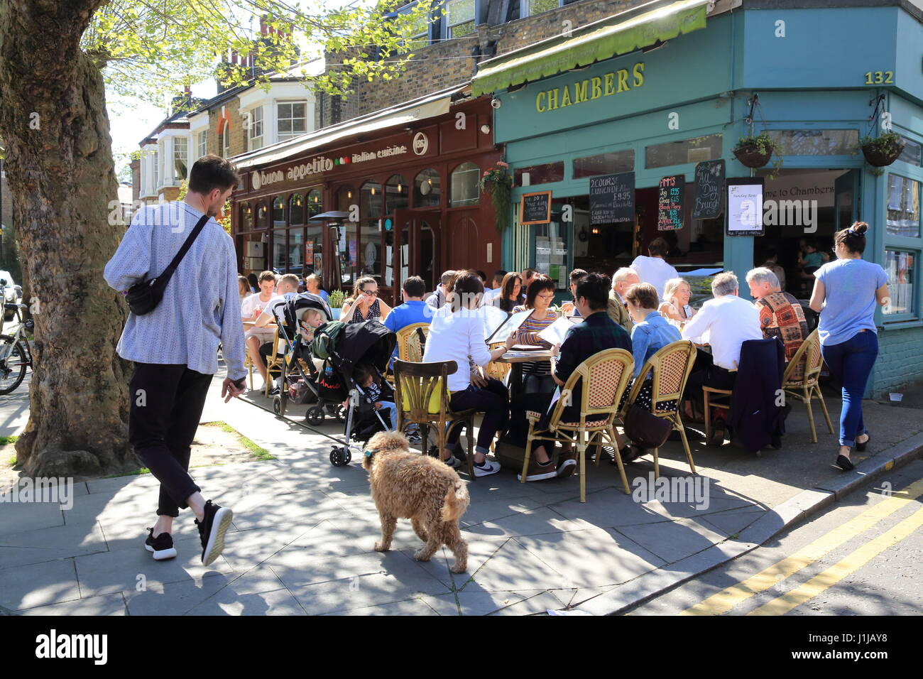 Bars and restaurants in trendy Lauriston Road in Victoria Village Park, east London, E9, UK Stock Photo
