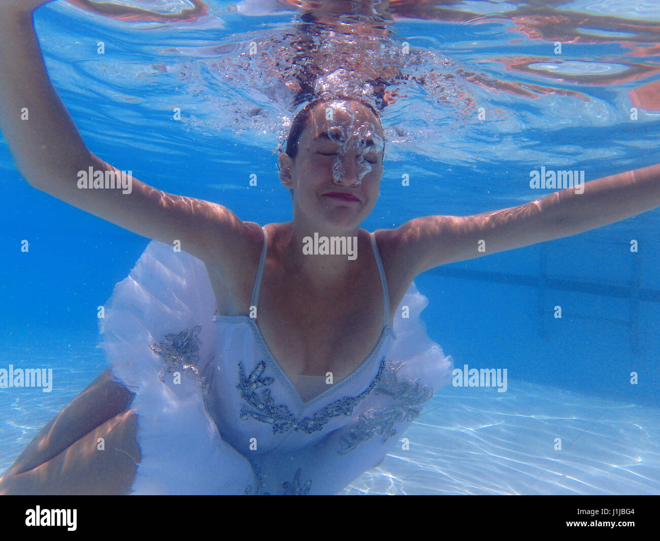 Underwater Dancer. Beautiful ballerina dressed with ballet tutu and Stock  Photo - Alamy