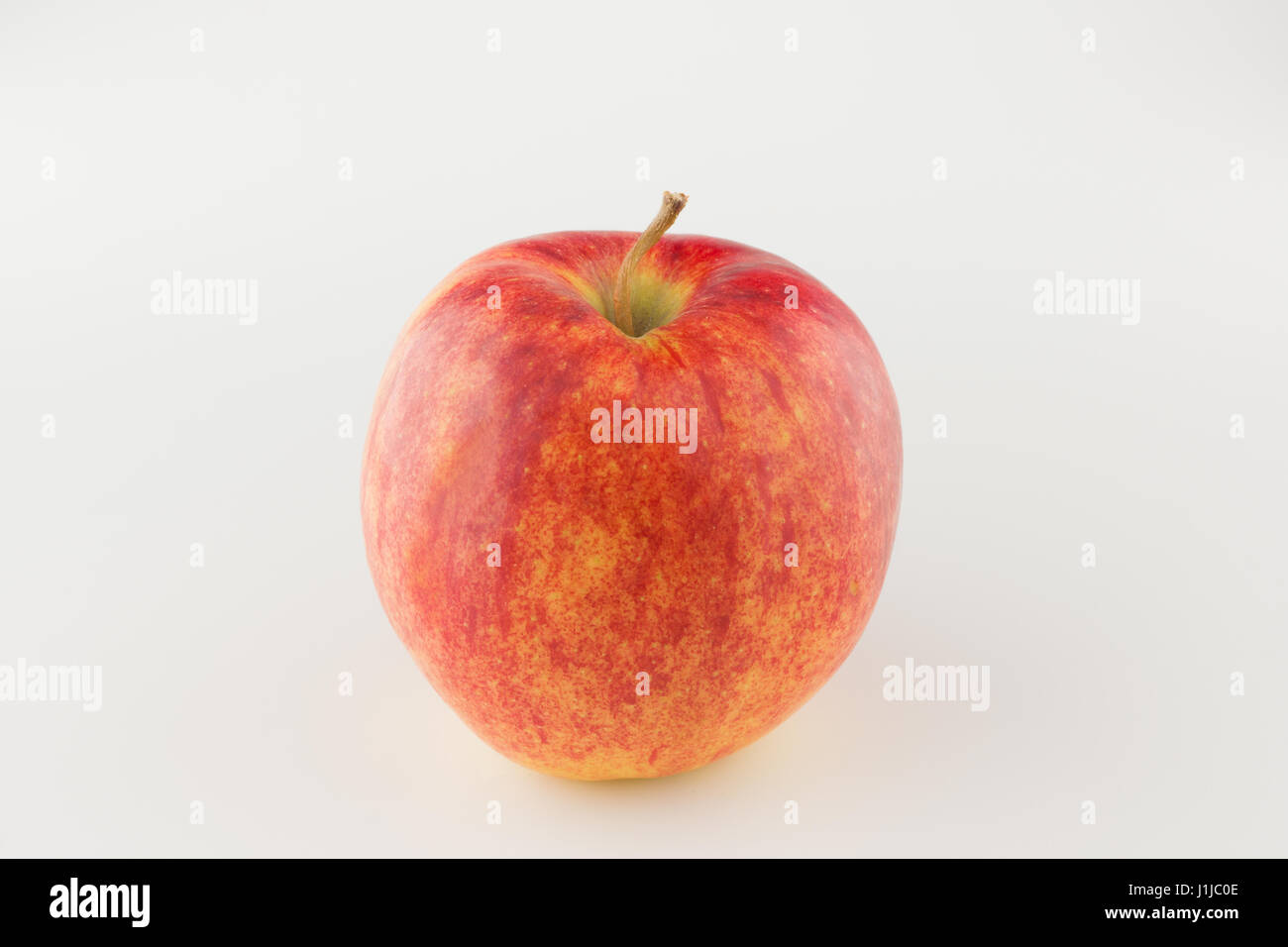 Red ripe apple on a white background Stock Photo