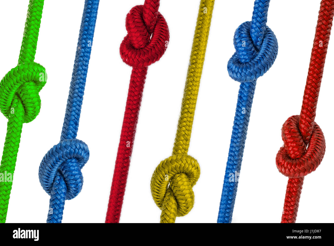 colored knotted ropes - ropes with knots colorized Stock Photo