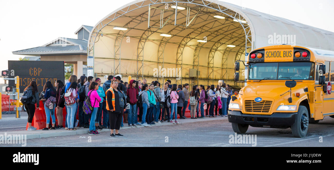 Columbus, New Mexico - Hundreds of children from the border town of Palomas, Chihuahua cross into New Mexico every morning and board school buses to a Stock Photo