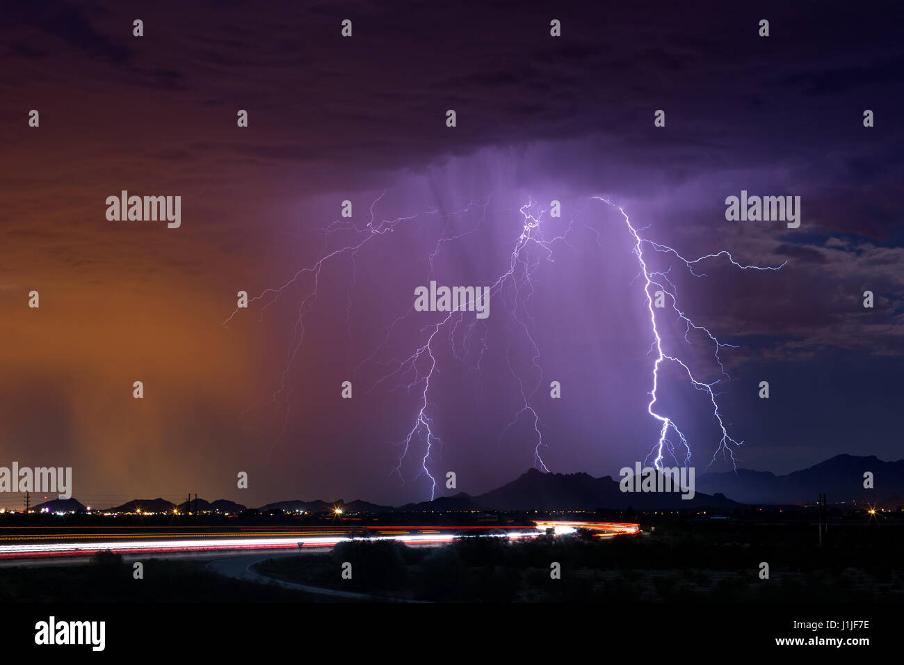 Monsoon thunderstorm and lightning strike with rain in Tucson, Arizona