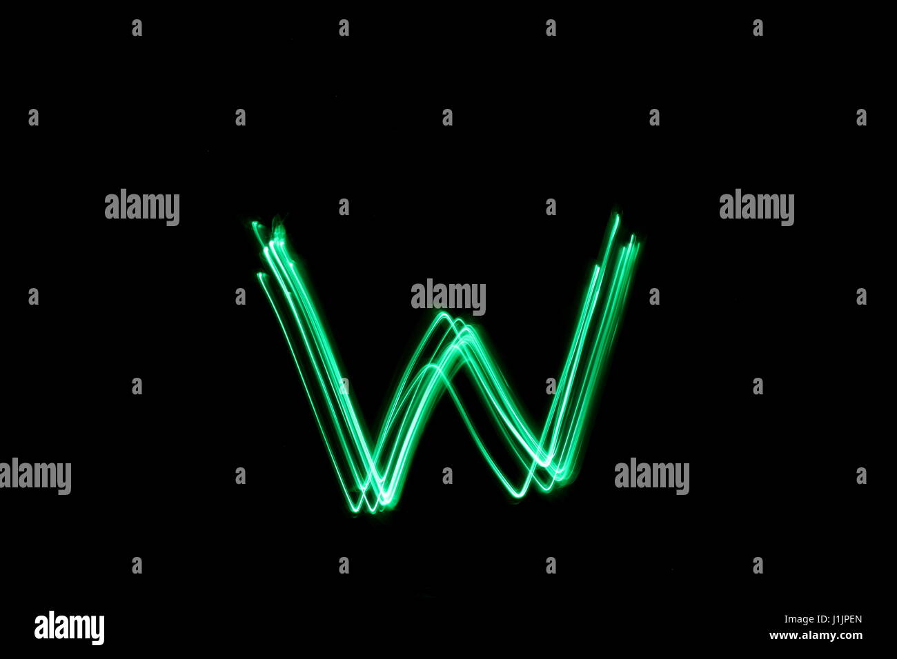 Green Light Painting Photography - letter W of alphabet series on a ...