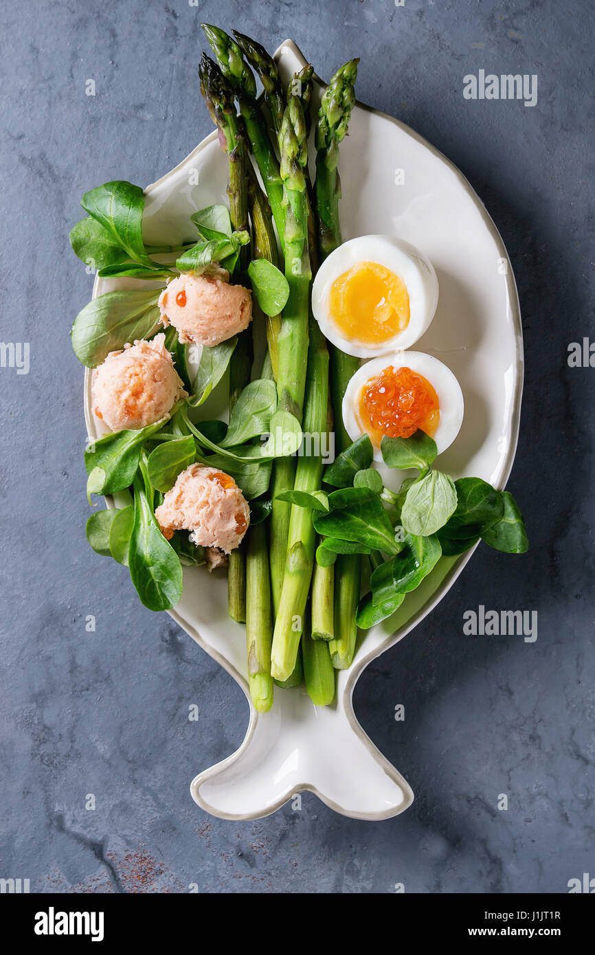 Cooked green asparagus with egg Stock Photo Alamy