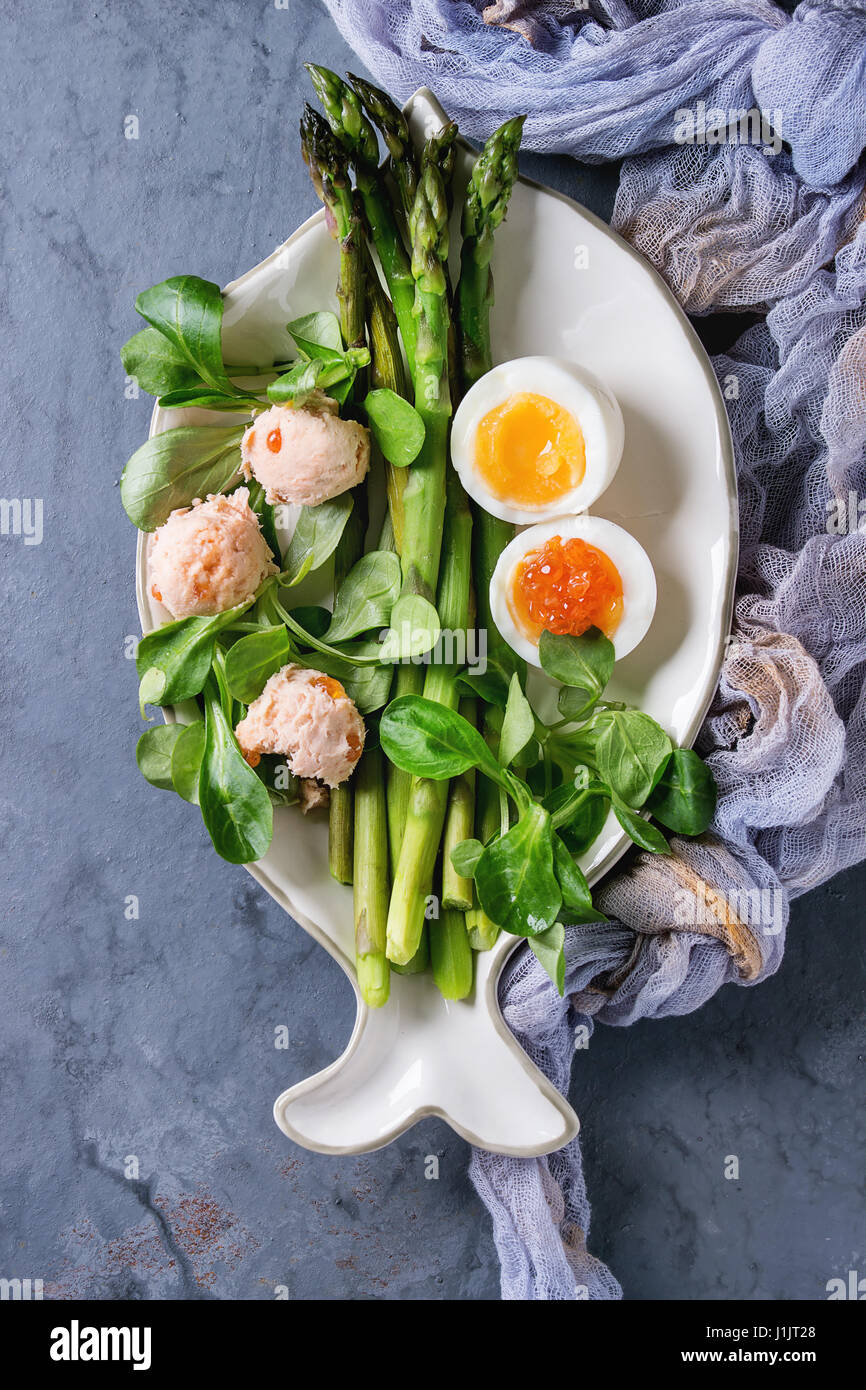 Cooked green asparagus with egg Stock Photo Alamy