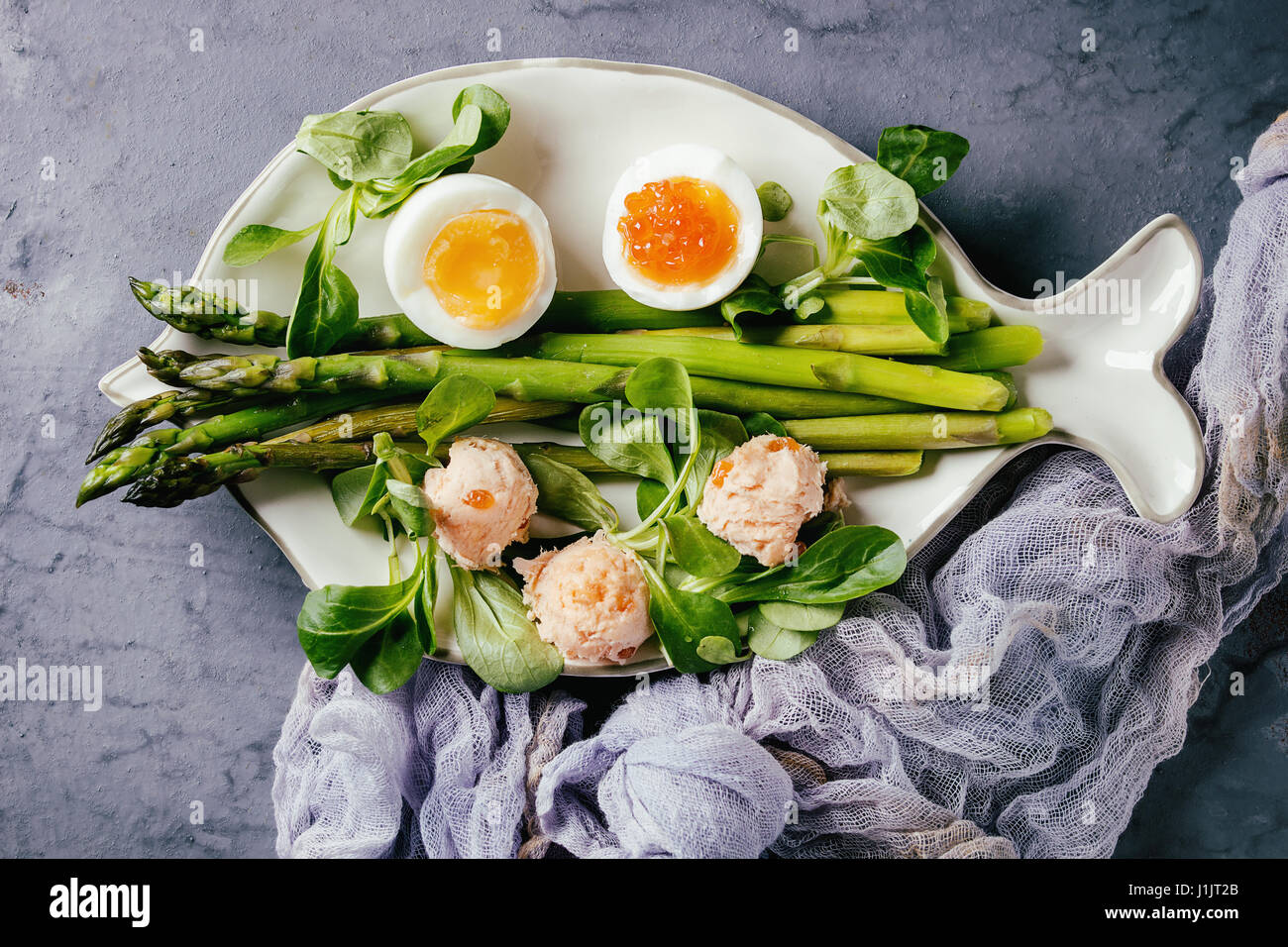 Cooked green asparagus with egg Stock Photo Alamy