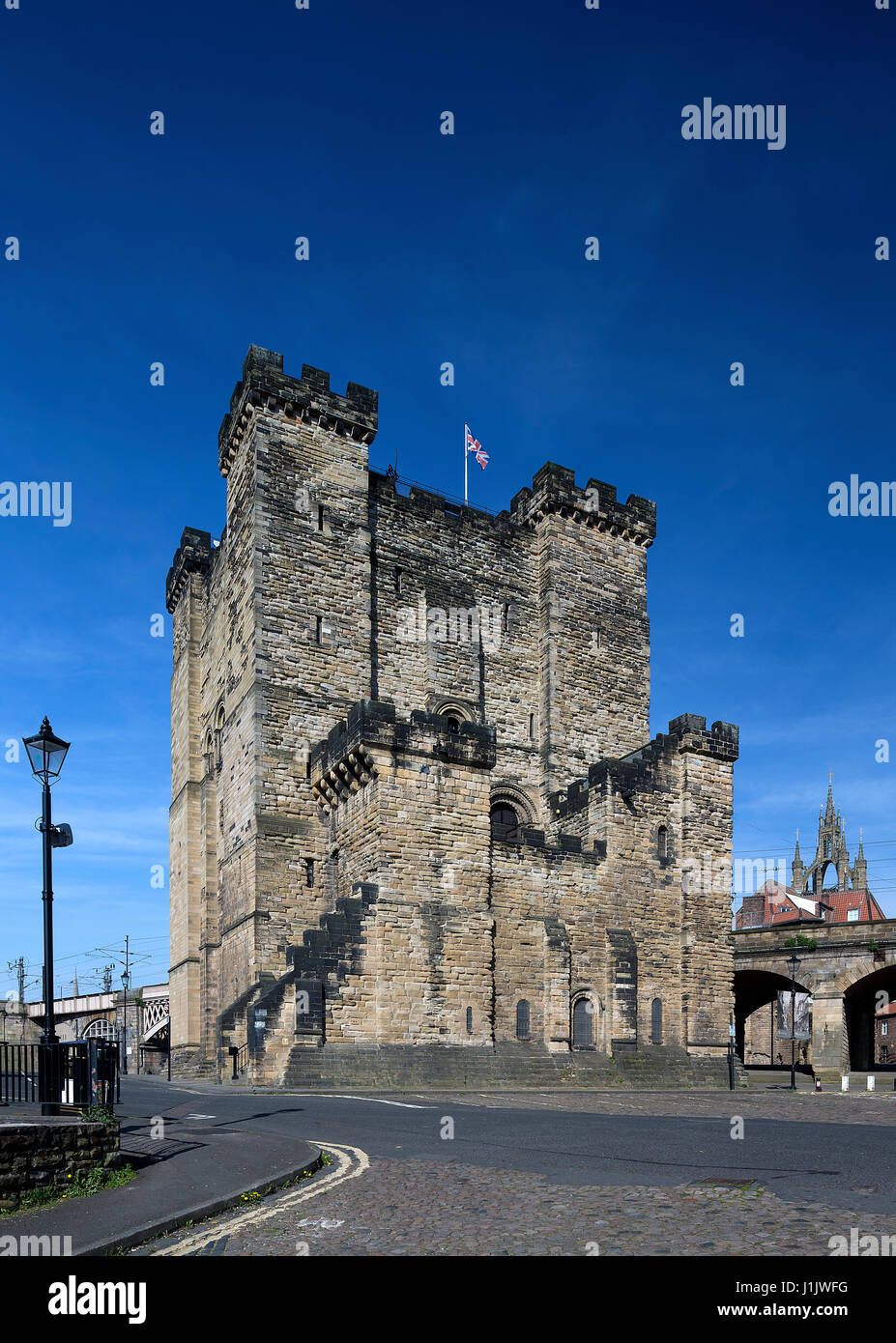A daytime view in summer against blue skies of the Castle Keep in Newcastle upon Tyne, North