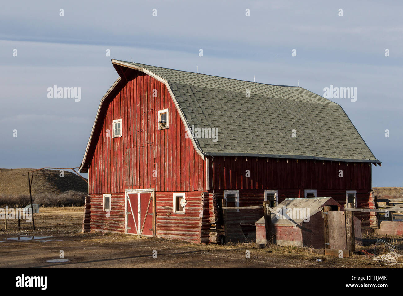 Old Red Log Barn Has Seen Better Days Deteriorating Roofing