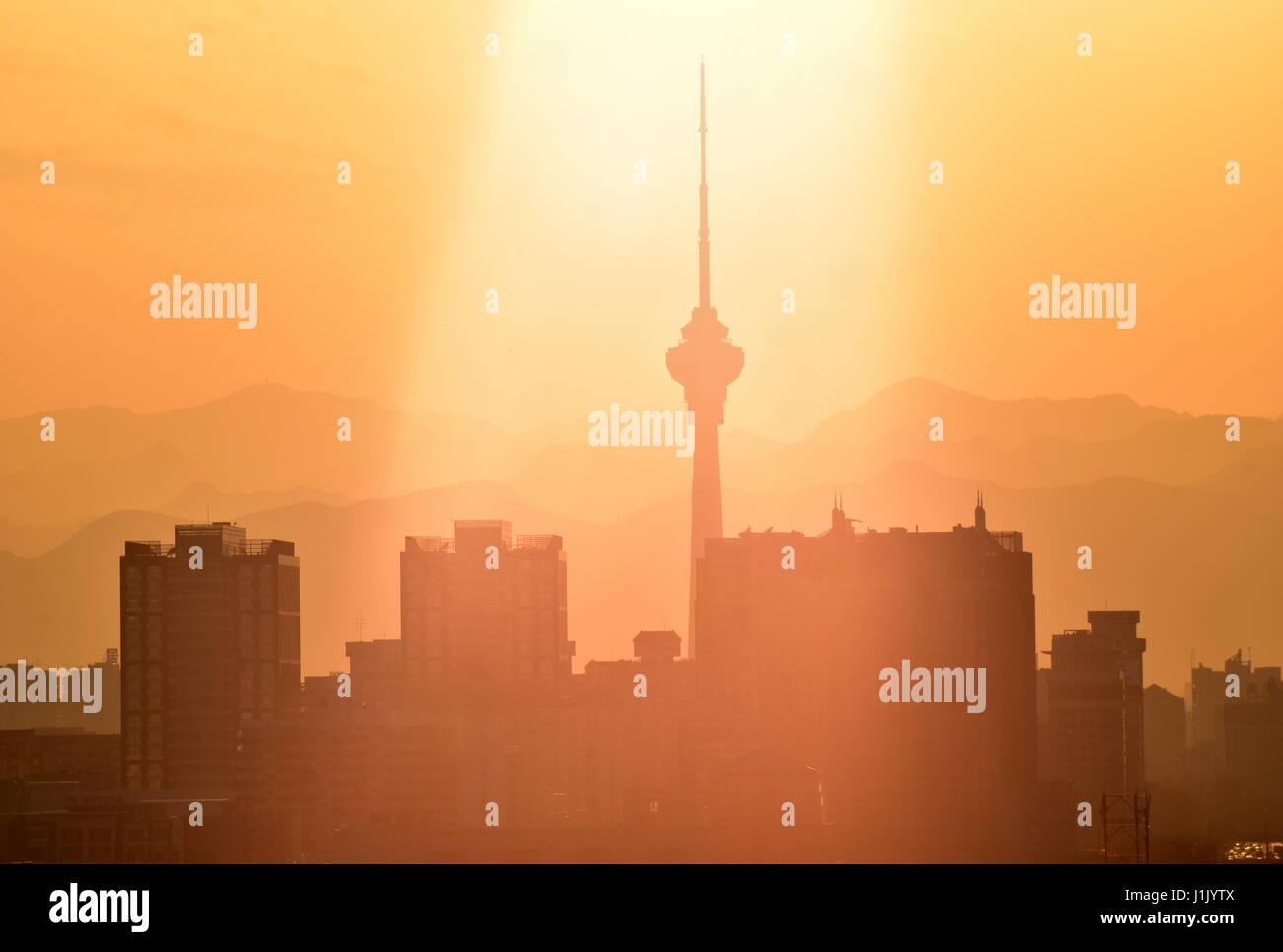 Beijing orange city skyline state media Central Radio & TV Tower in the spotlight, China Stock Photo