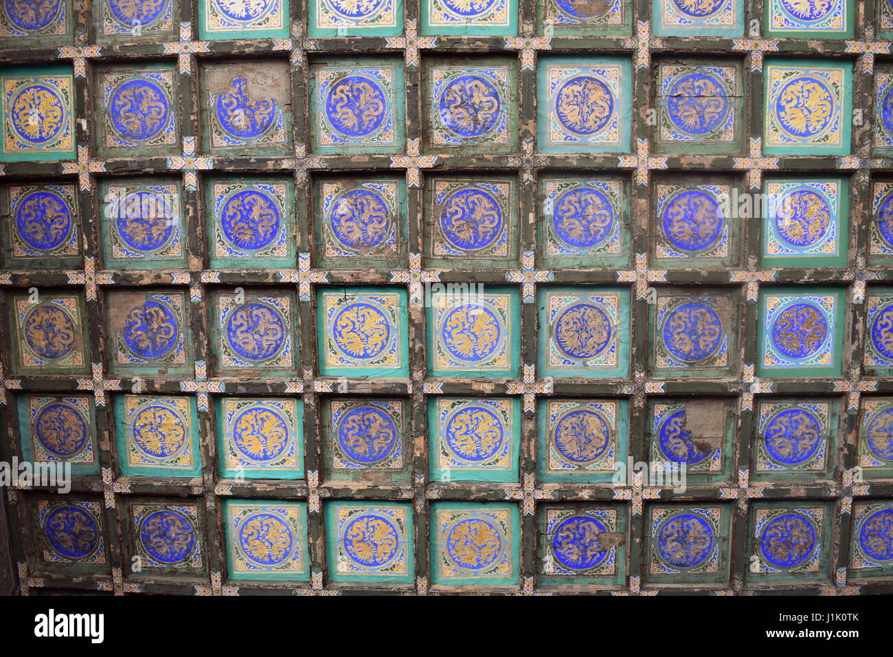 Beautiful Chinese art decorations on ceiling of the Beijing Forbidden City palace complex Stock Photo