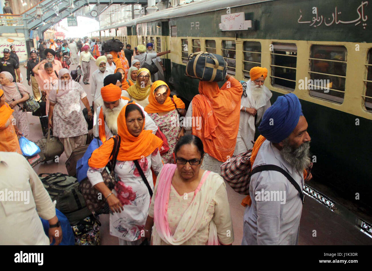 Sikh Yatri going back to India after attending Vesakhi Mela and their religious rituals in Lahore, at Lahore Junction on Friday, April 21, 2017. Stock Photo