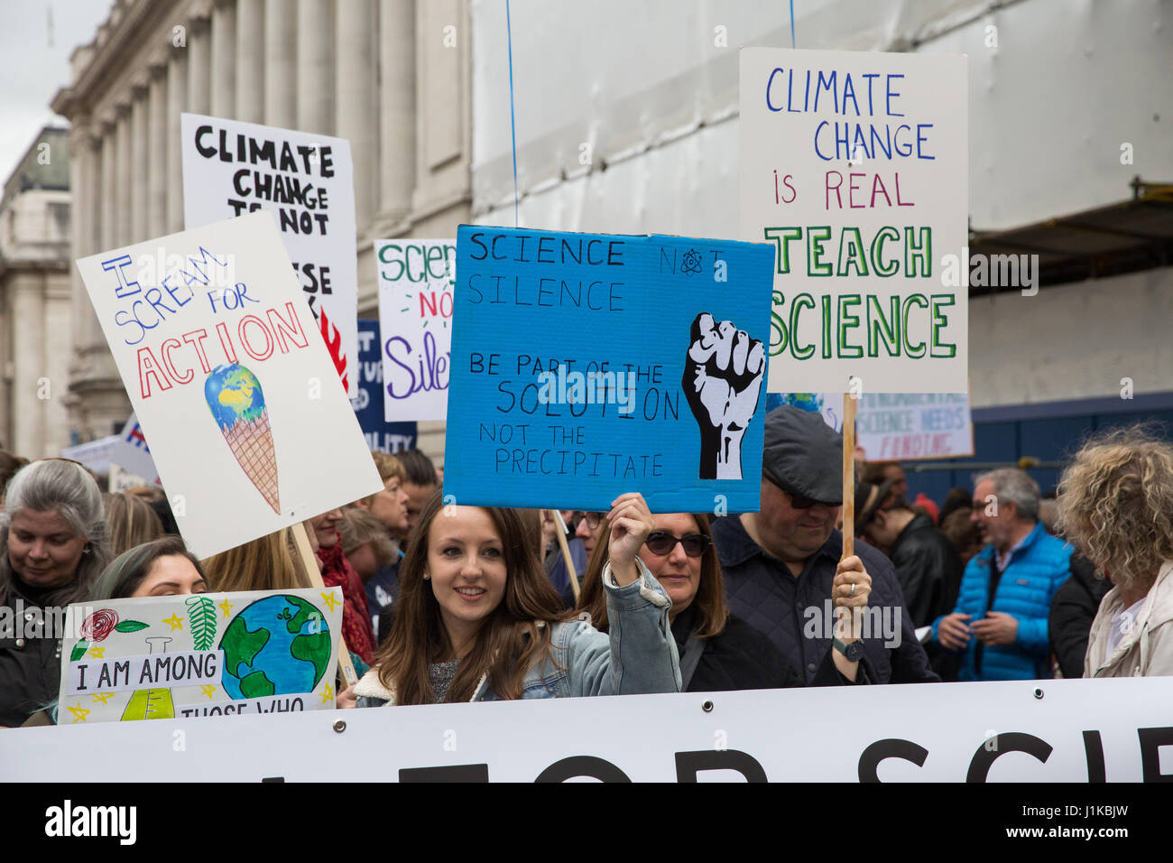 London, UK. 22nd Apr, 2017. Scientists prepare to march through central London on the ‘March for Science' as part of a global protest march in the name of science. The organisers of the march, which took place on Earth Day, stated that science is ‘under attack' from the administration of President Trump, with cuts to research funding into climate change and cancer and controversial statements by advisors such as Scott Pruitt, head of the US Environmental Protection Agency, who denied that carbon dioxide emissions are a primary cause of global warming. Credit: Mark Kerrison/Alamy Live News Stock Photo