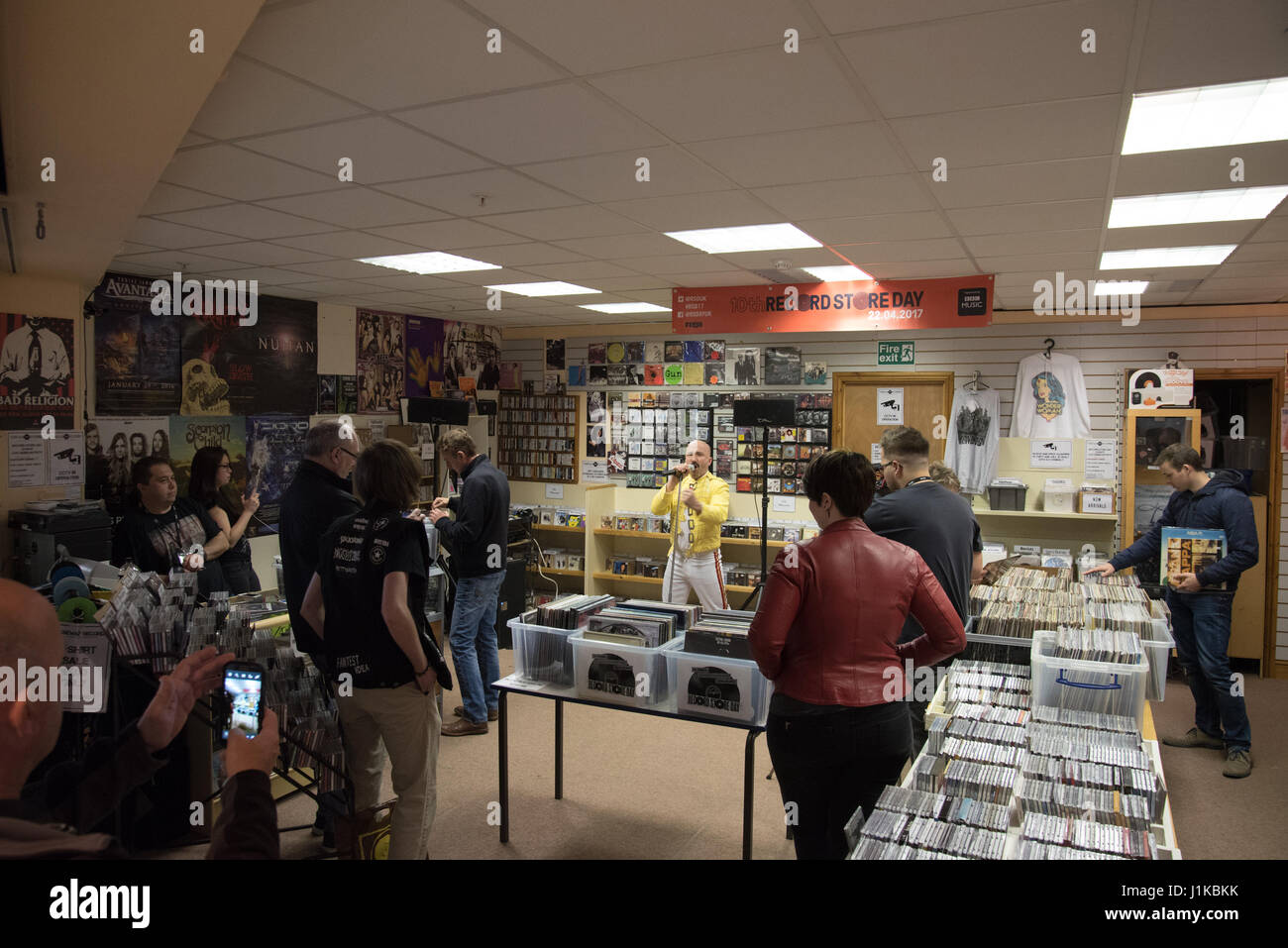 Shrewsbury, Shropshire, UK. 22nd April 2017. Inside Tubeway Records, one of three independent vinyl record shops in Shrewsbury, Shropshire that opened their doors for the 10th Record Store Day, 2017. Many shops have live music playing on Record Store Day and today in Tubeway Records, a Queen tribute act entertained the many shoppers. Credit: Richard Franklin/Alamy Live News Stock Photo