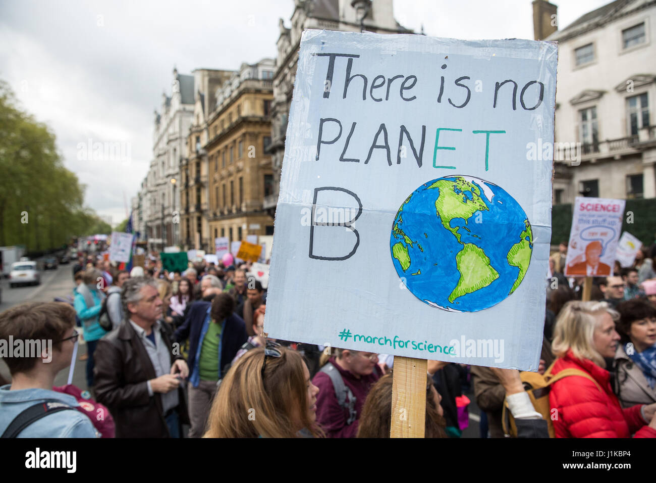 London, UK. 22nd Apr, 2017. Scientists march through central London on the ‘March for Science' as part of a global protest march in the name of science. The organisers of the march, which took place on Earth Day, stated that science is ‘under attack' from the administration of President Trump, with cuts to research funding into climate change and cancer and controversial statements by advisors such as Scott Pruitt, head of the US Environmental Protection Agency, who denied that carbon dioxide emissions are a primary cause of global warming. Credit: Mark Kerrison/Alamy Live News Stock Photo