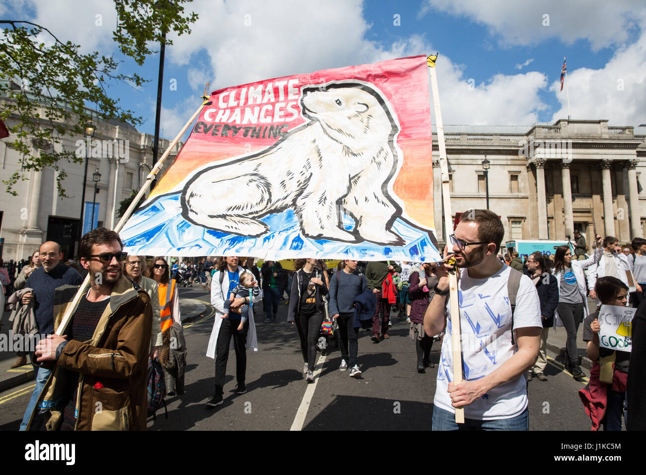 London, UK. 22nd April, 2017. Scientists march through central London on the ‘March for Science’ as part of a global protest march in the name of science. The organisers of the march, which took place on Earth Day, stated that science is ‘under attack’ from the administration of President Trump, with cuts to research funding into climate change and cancer and controversial statements by advisors such as Scott Pruitt, head of the US Environmental Protection Agency, who denied that carbon dioxide emissions are a primary cause of global warming. Stock Photo