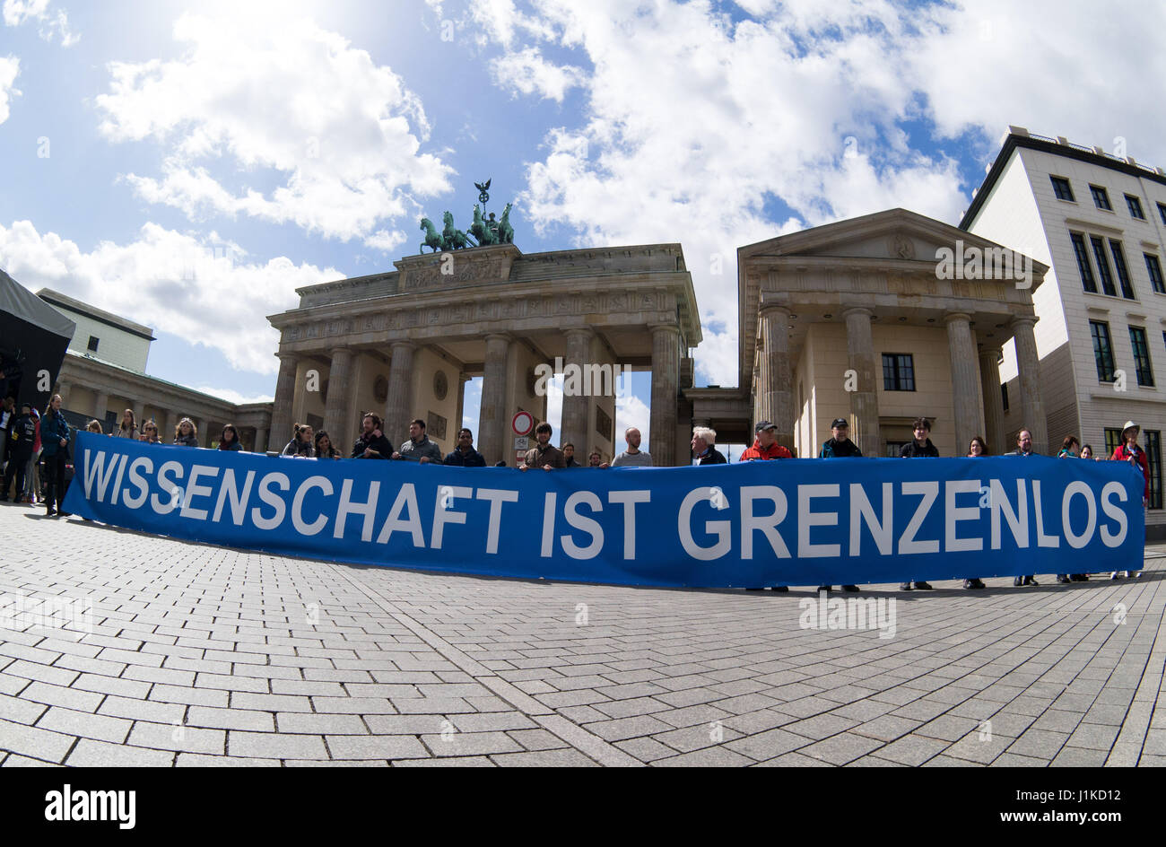 Berlin, Germany. 22nd Apr, 2017. A banner reading 'Science is without borders' can be seen at the 'March for Science' in front of the Brandenburg Gate in Berlin, Germany, 22 April 2017. Scientists are calling their work to attention on a global scale. Photo: Jörg Carstensen/dpa/Alamy Live News Stock Photo