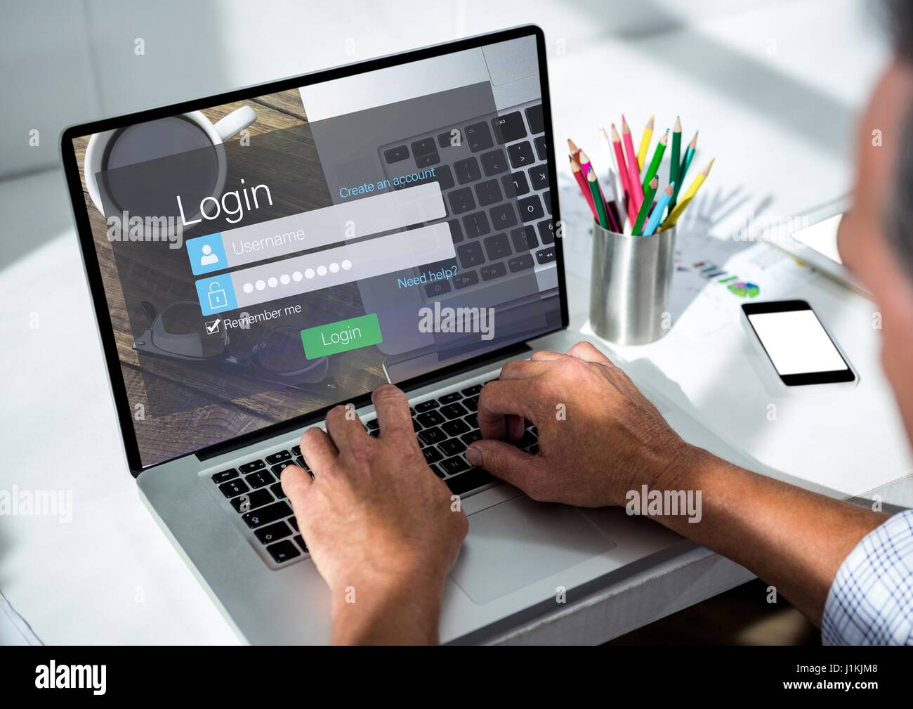 Digital Composite Of Men With Laptop On The Desk Screen With