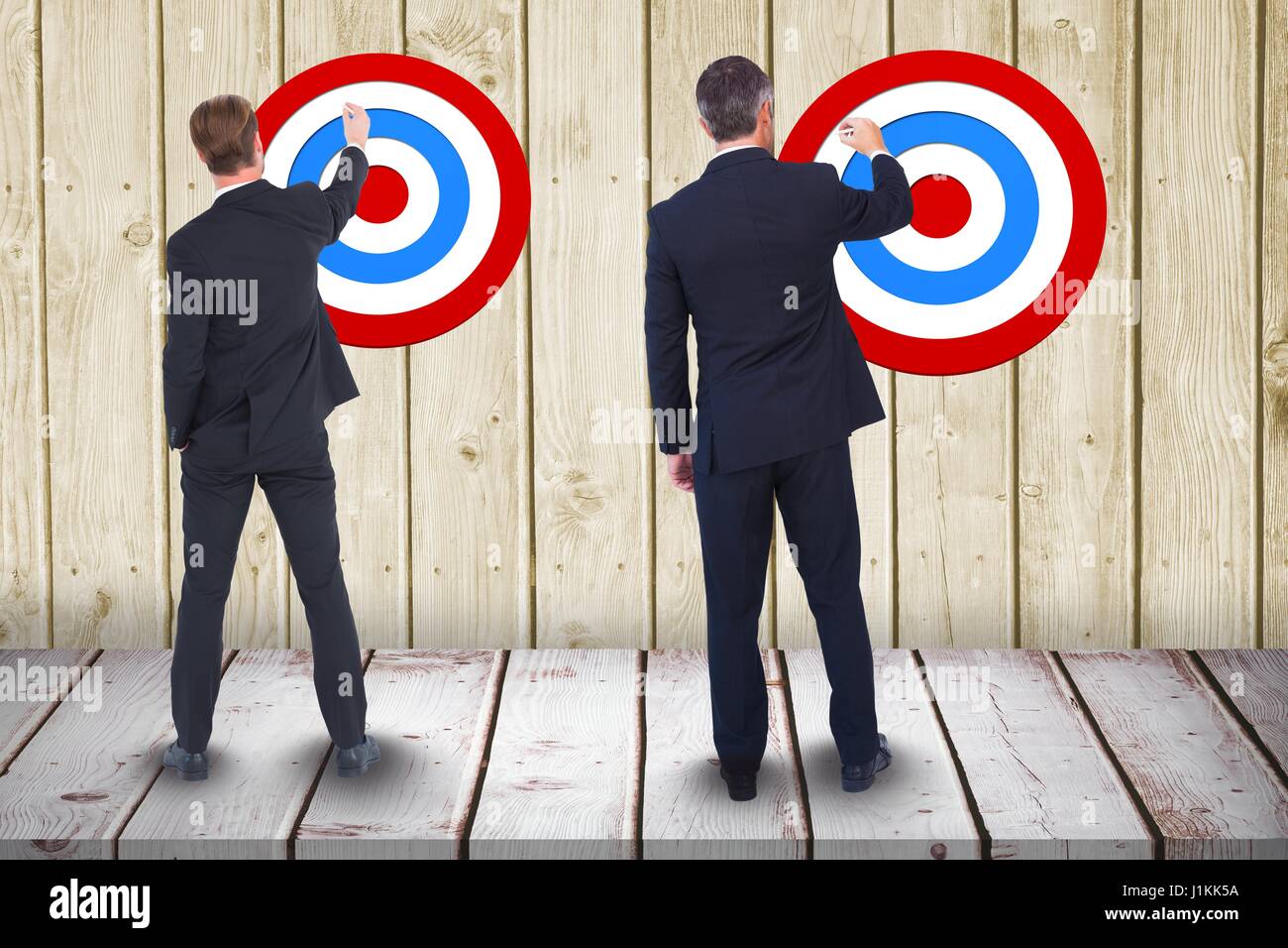 Full Person Rear View Target Digital composite of Full length rear view of businessmen setting ...