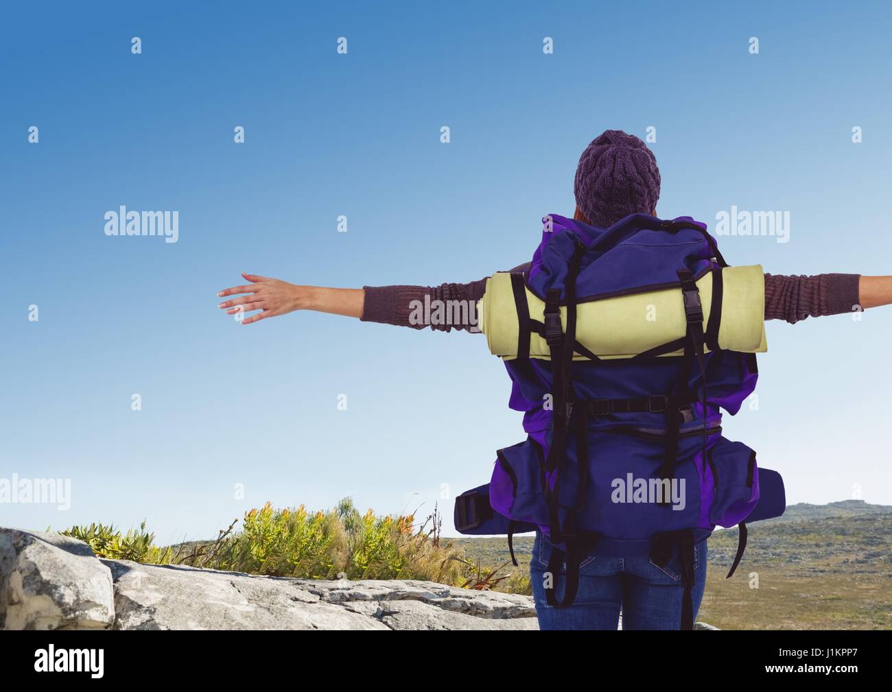 Digital composite of travel mountain. hands open looking the landscape Stock Photo