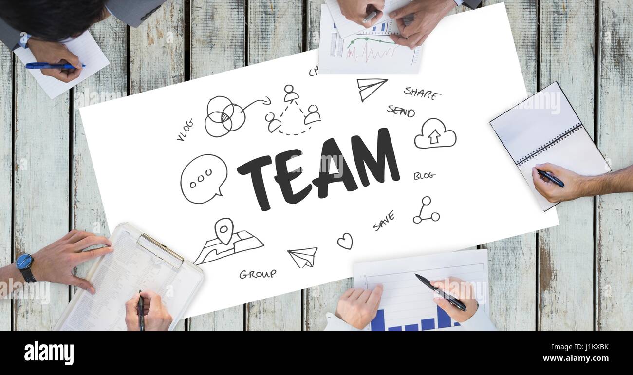Digital composite of Team text by icons and business people on table ...