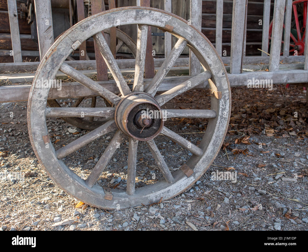 Wooden wheel of a rack wagon Stock Photo - Alamy