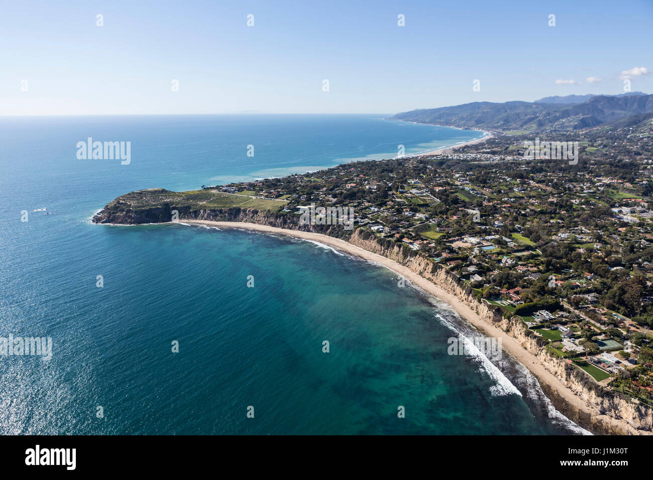 Aerial view of ocean view homes and Point Dume State Park in Malibu