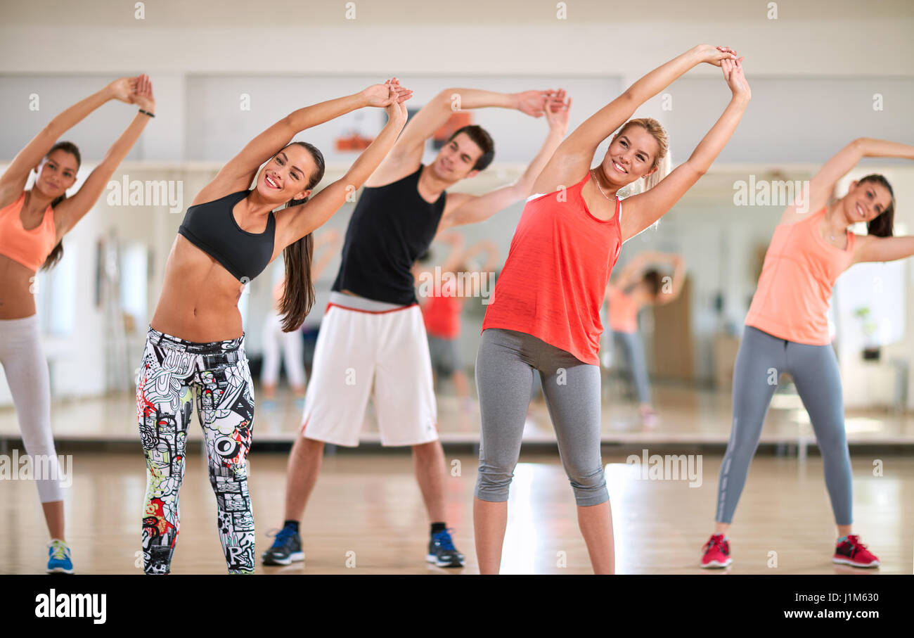 Young fitness group on training indoor Stock Photo