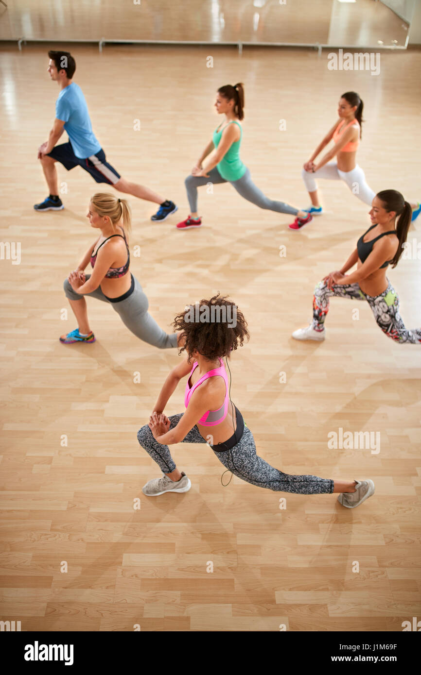Top view on fitness class with exercisers in colorful sportswear Stock Photo