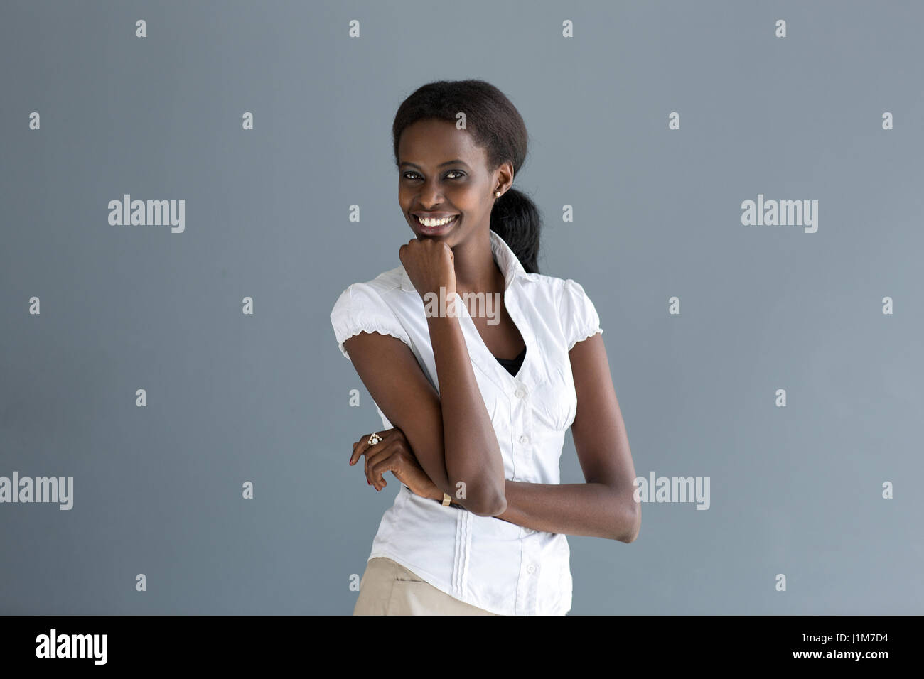 Young attractive African black woman smiling Stock Photo - Alamy