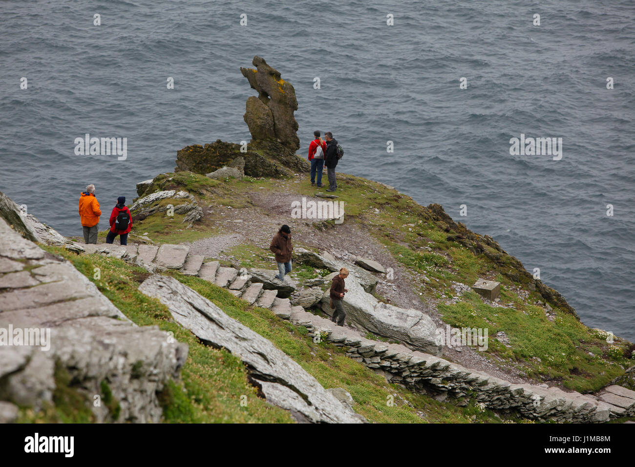 Tourists visit Skellig Michael. Stock Photo