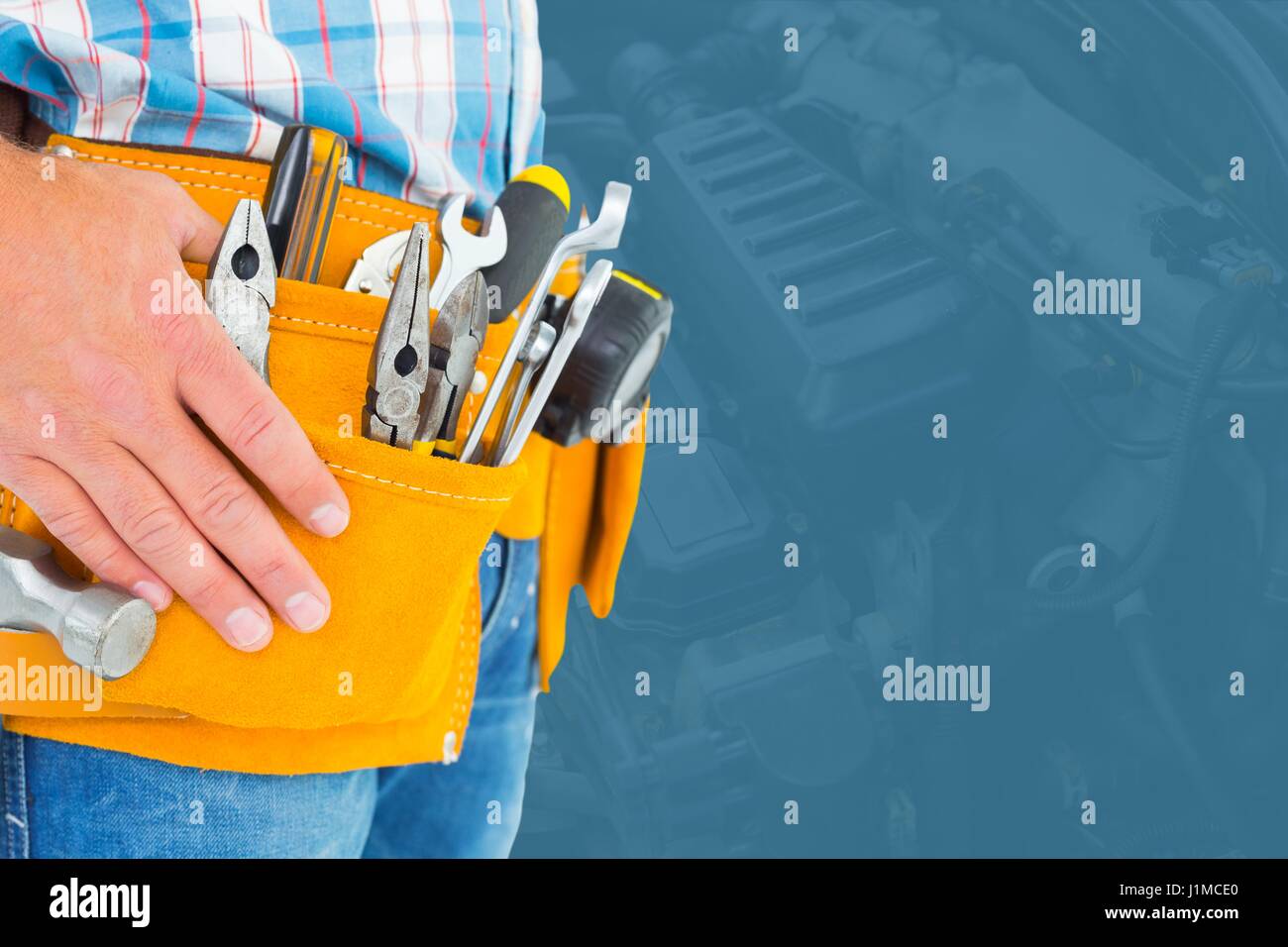 Digital composite of Midsection of handyman with tools Stock Photo