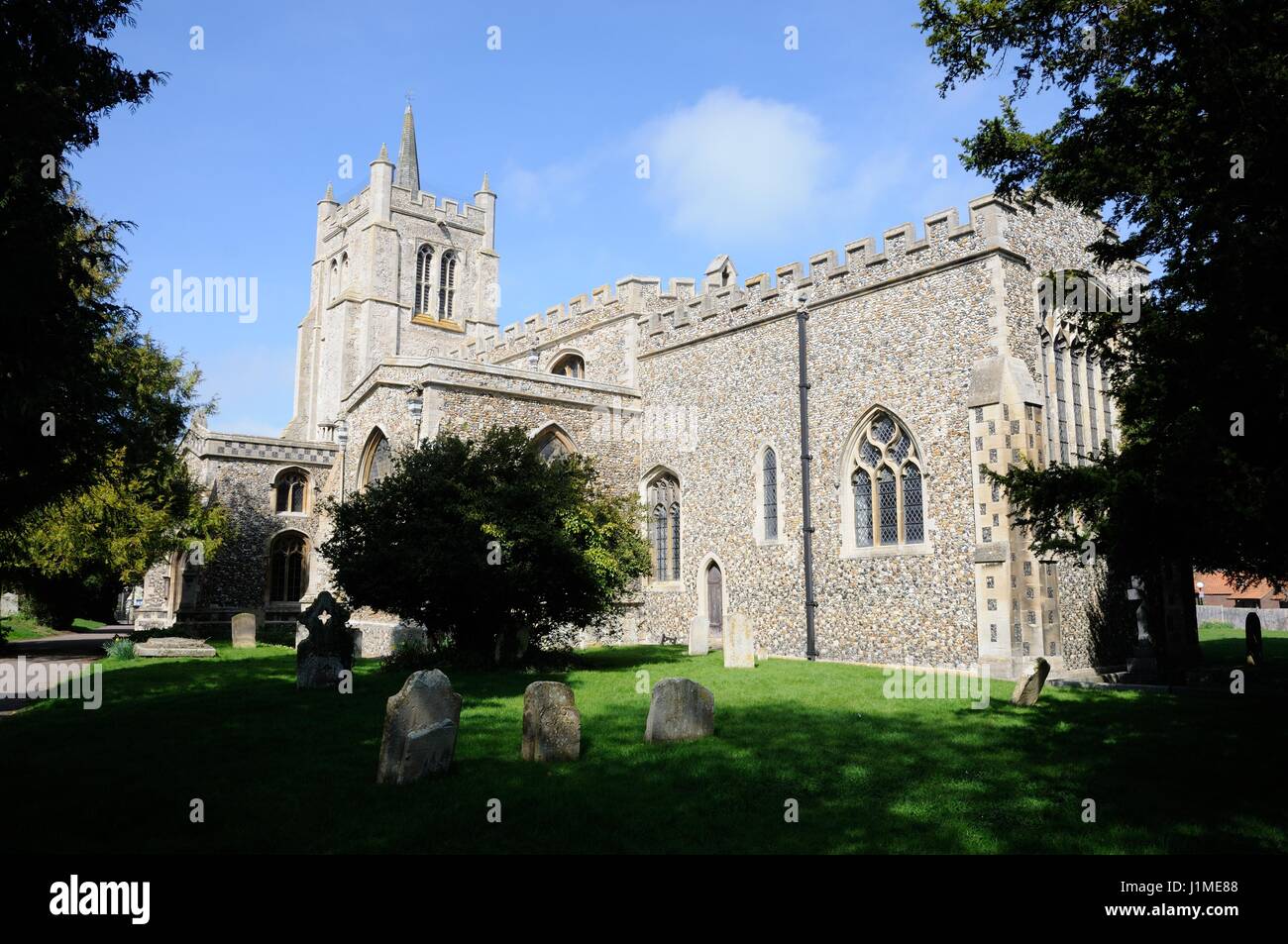 All Saints Church, Melbourn, Cambridgeshire, dates back to the thirteenth century.   It is built of flint and pebble rubble. Stock Photo