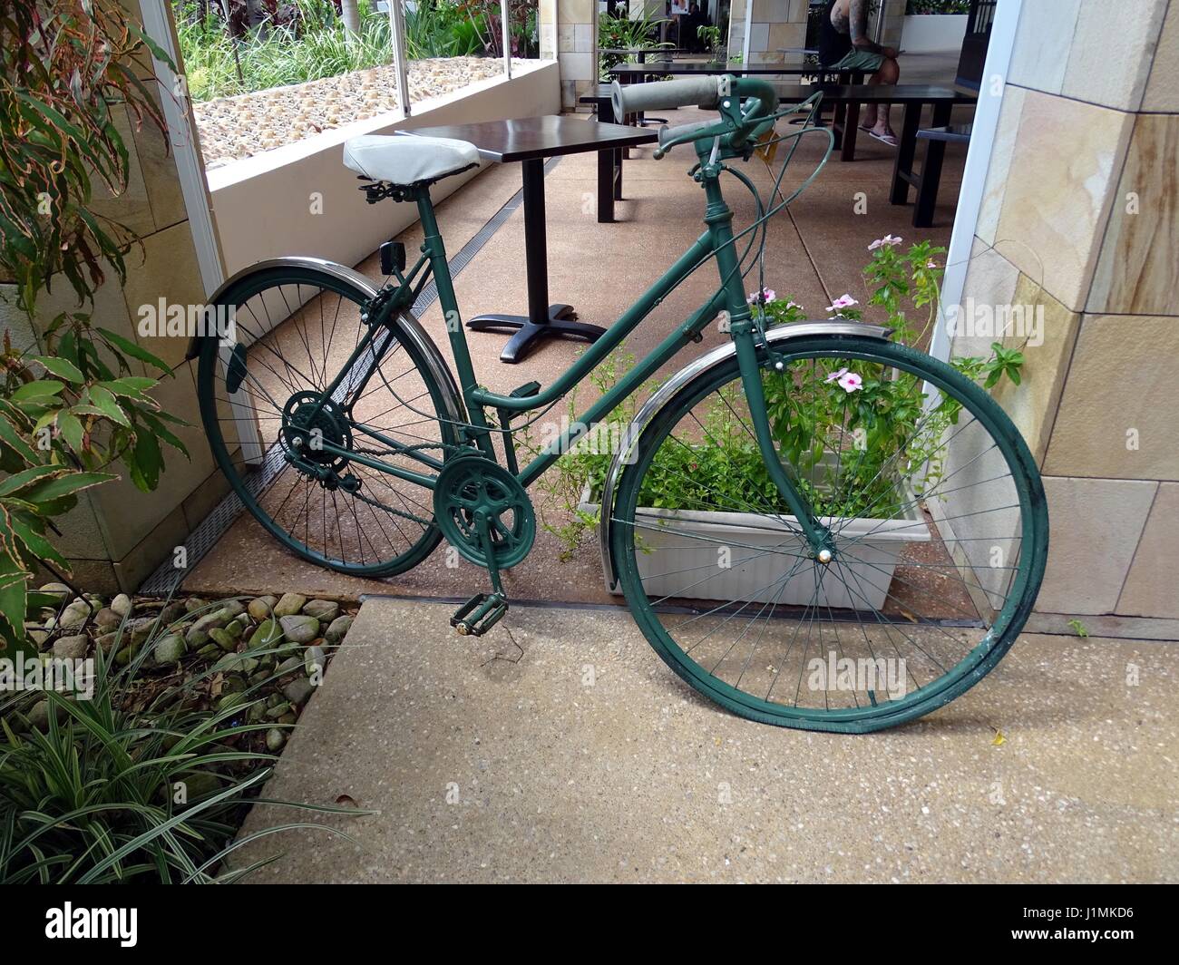 A green vintage bicycle Stock Photo Alamy