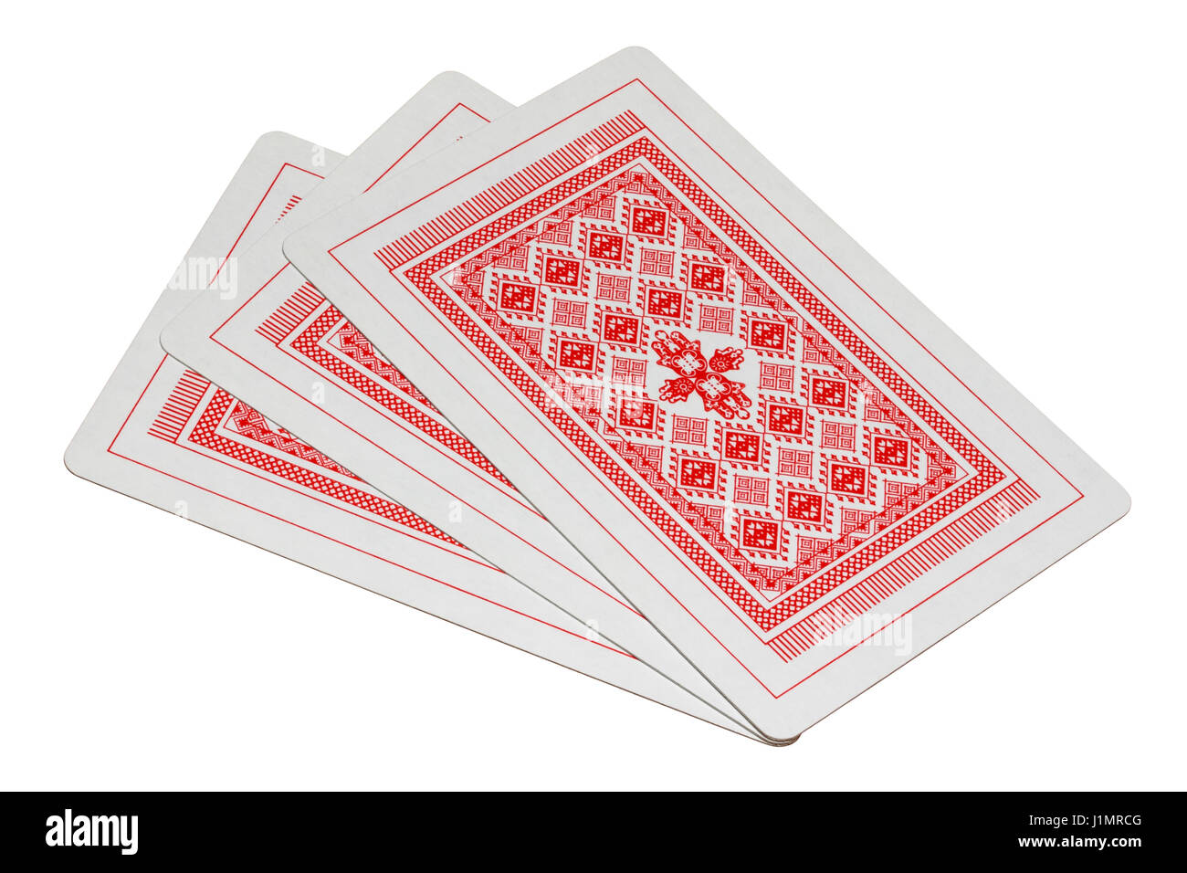 Fan of three playing cards face down back isolated on a white background Stock Photo