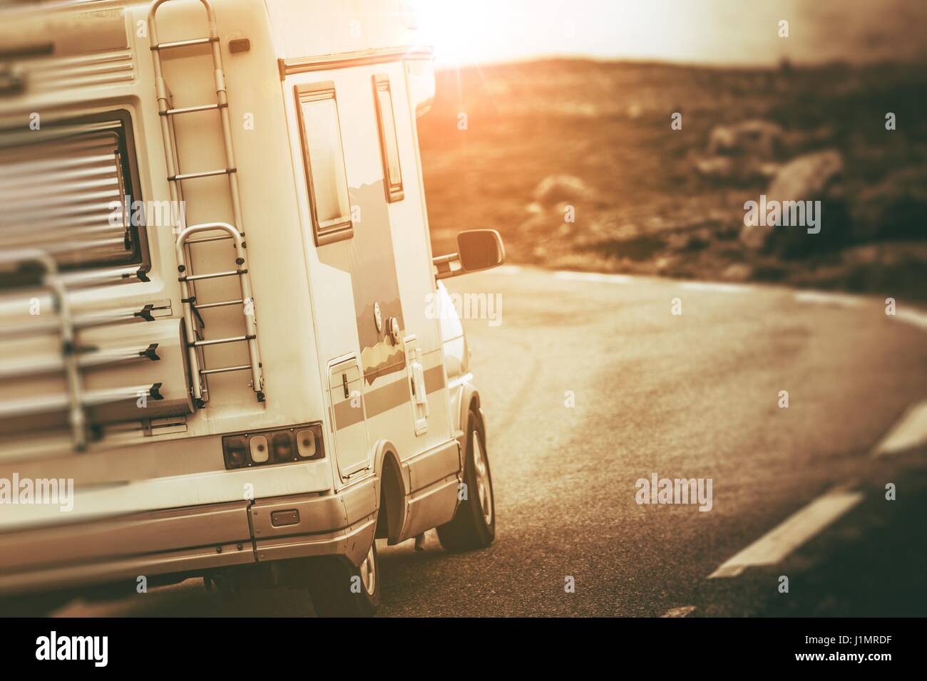 Camper Van on the Scenic Mountain Road. RV Motorhome Traveling Concept ...