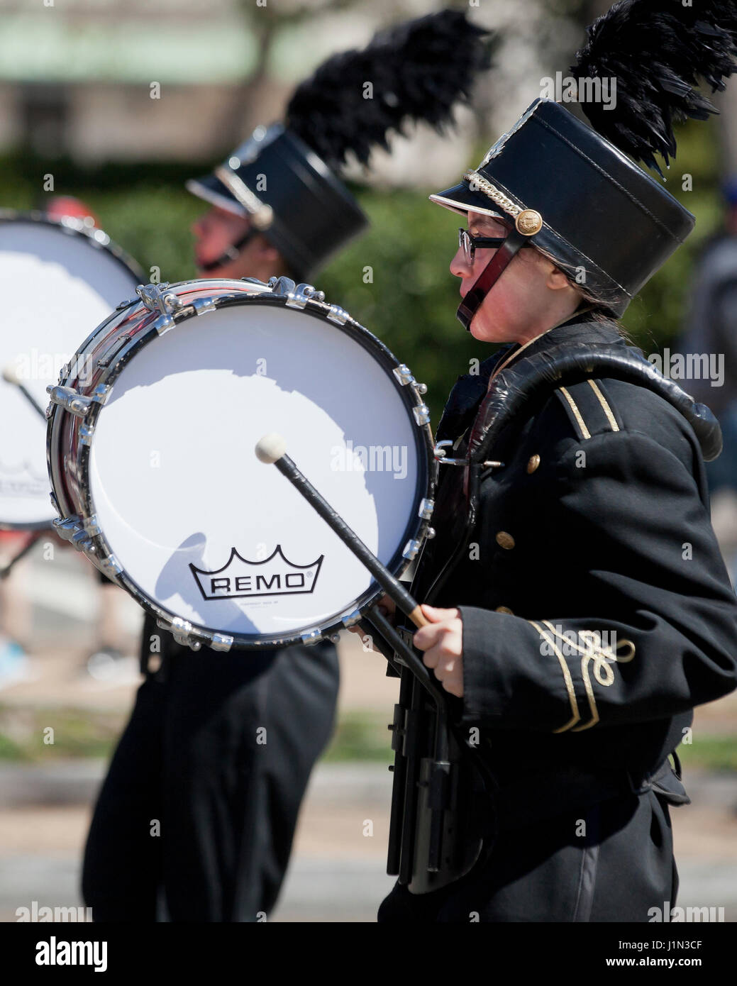 Bass drum player in high school marching band - USA Stock Photo