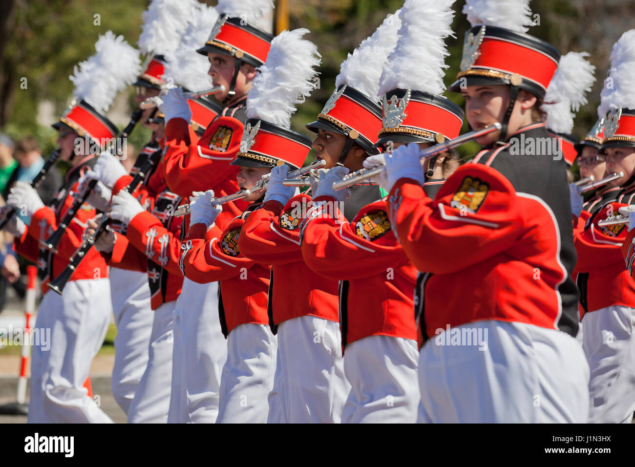 High school marching band flute players in parade - USA Stock Photo