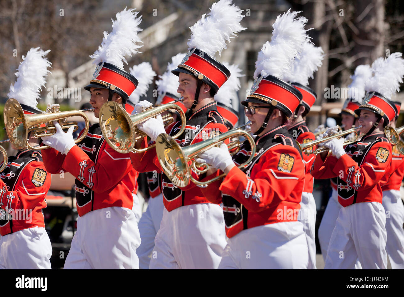 High school marching band cornet players during street parade - USA Stock Photo