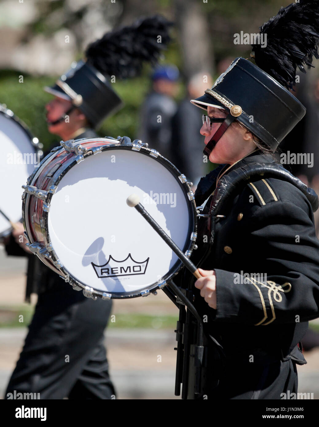 Bass drum player in high school marching band - USA Stock Photo