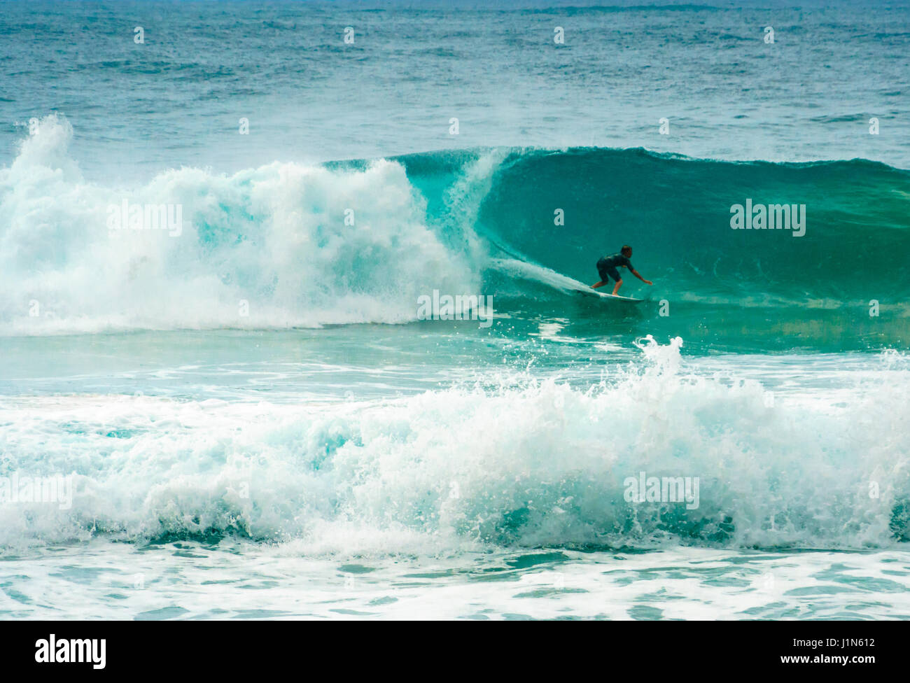 Hawaii kauai tunnels beach surfer hires stock photography and images