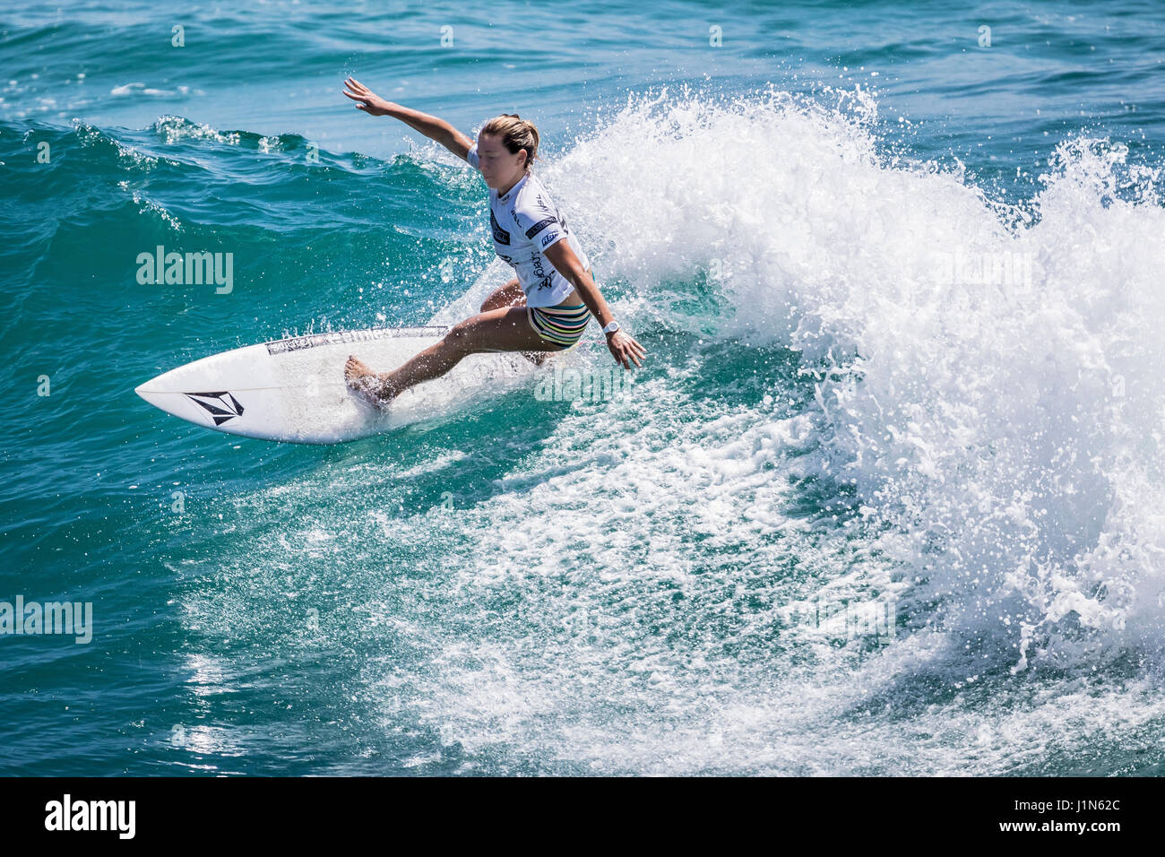 woman surfing supergirl pro championship Stock Photo Alamy