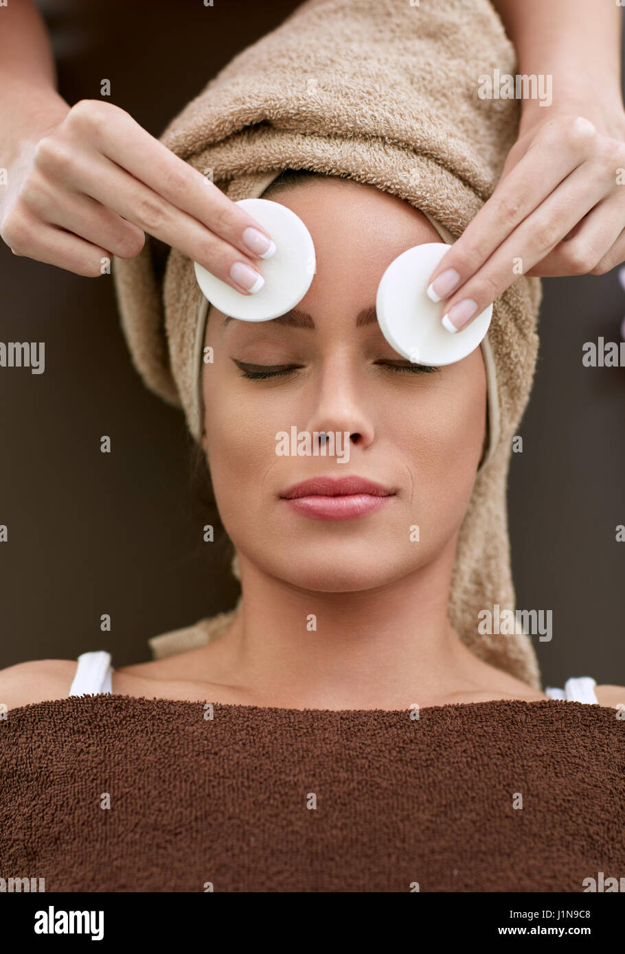 Skin care woman cleaning face by beautician Stock Photo Alamy