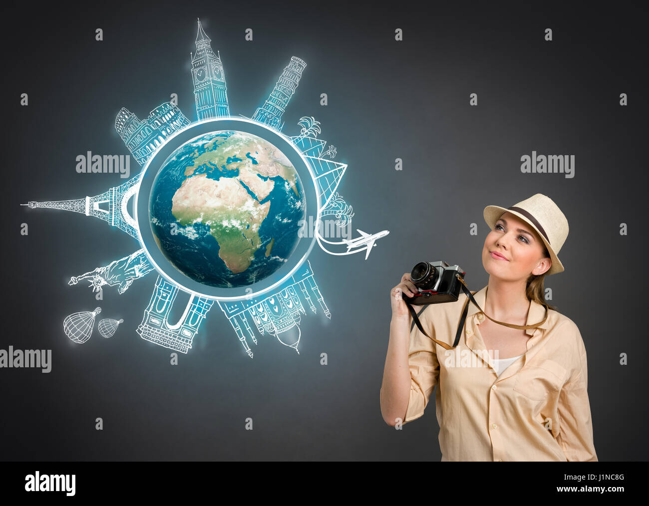 concept travel around the world, tourist with photo camera. Elements of this image are furnished by NASA Stock Photo