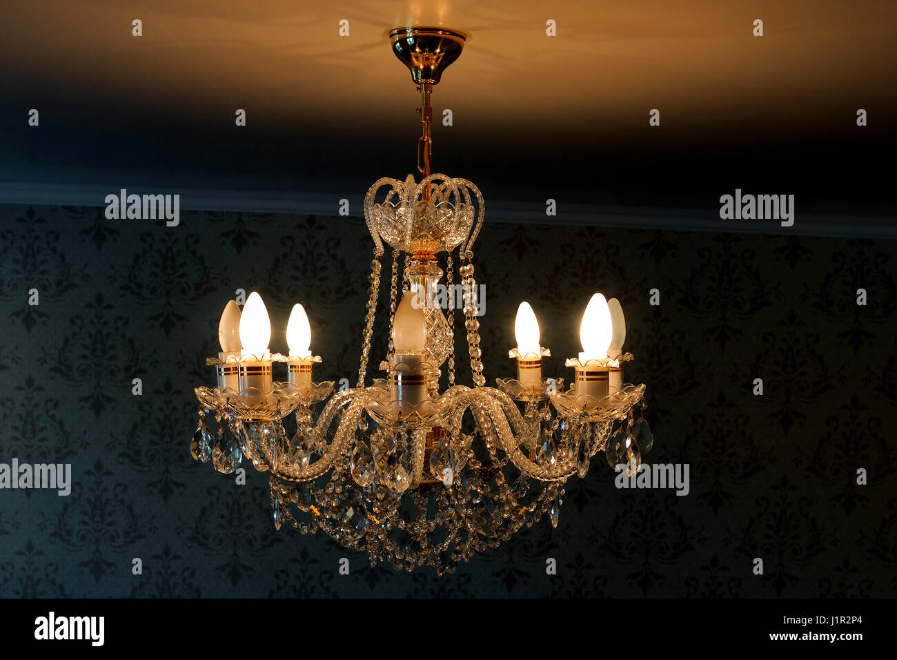 chandelier crystal light in the room from the ceiling Stock Photo