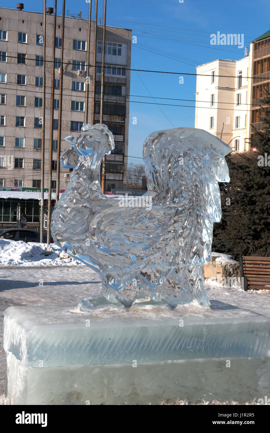 Cock ice sculpture in a recreation park Stock Photo
