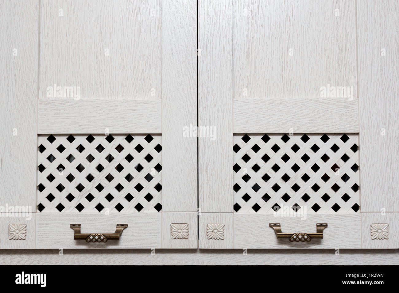 cabinet door with a metal handle in ancient style Stock Photo
