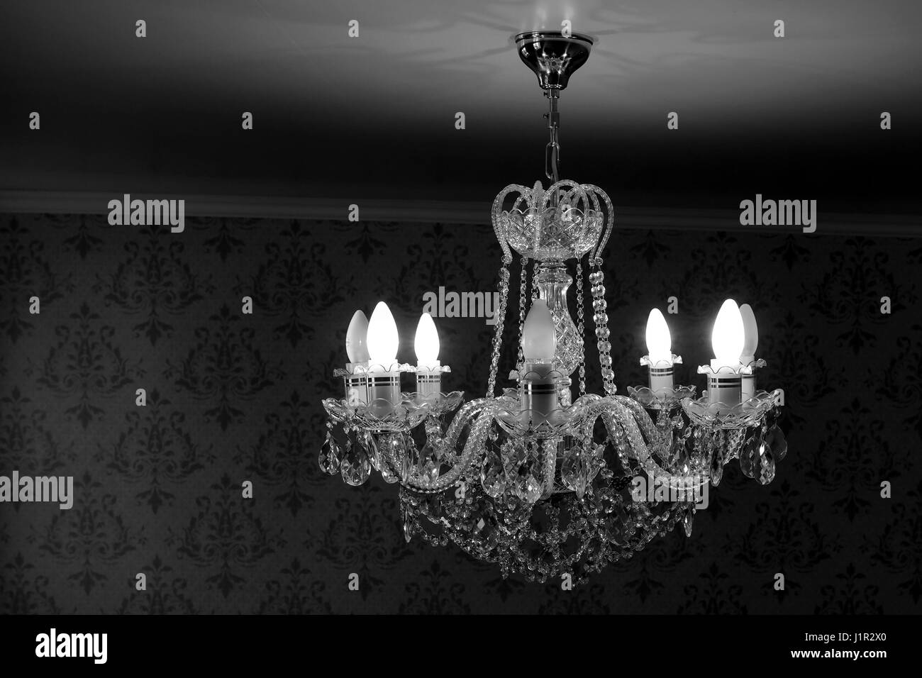chandelier crystal light in the room from the ceiling Stock Photo