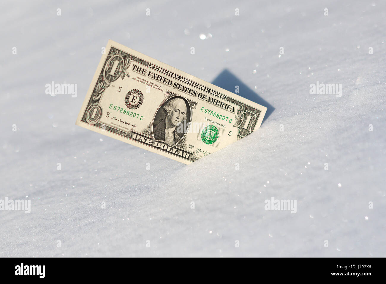 hundred dollars stuck in Snow White Stock Photo
