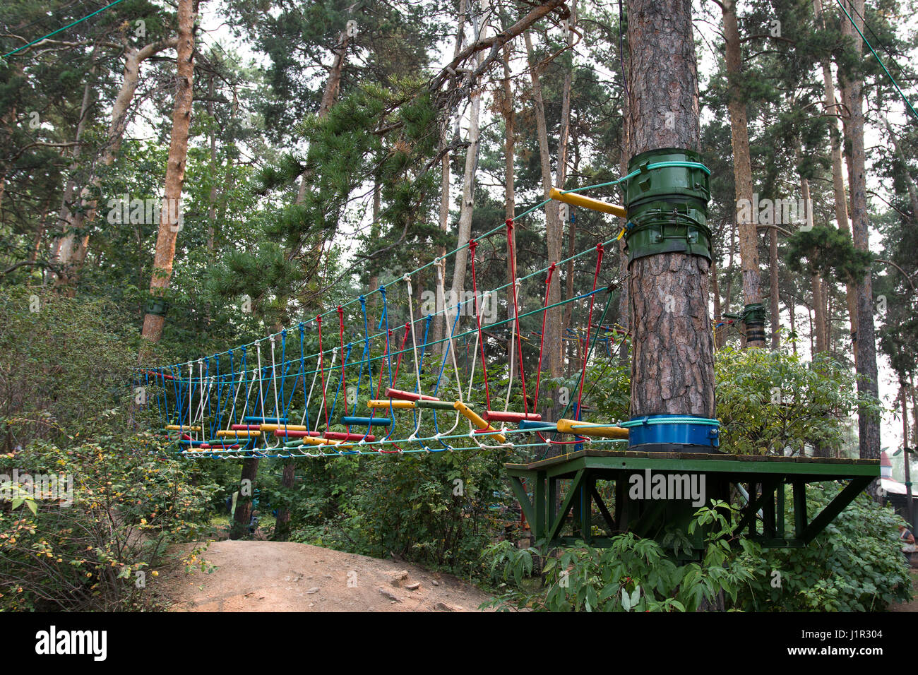 obstacle course in the trees in the park Stock Photo